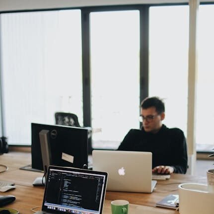 Manoj, Content Lead, working on content creation and strategy in a stylish office with natural light.-home